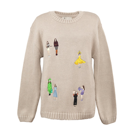 Sweterek dziecięcy z kolorowymi haftami